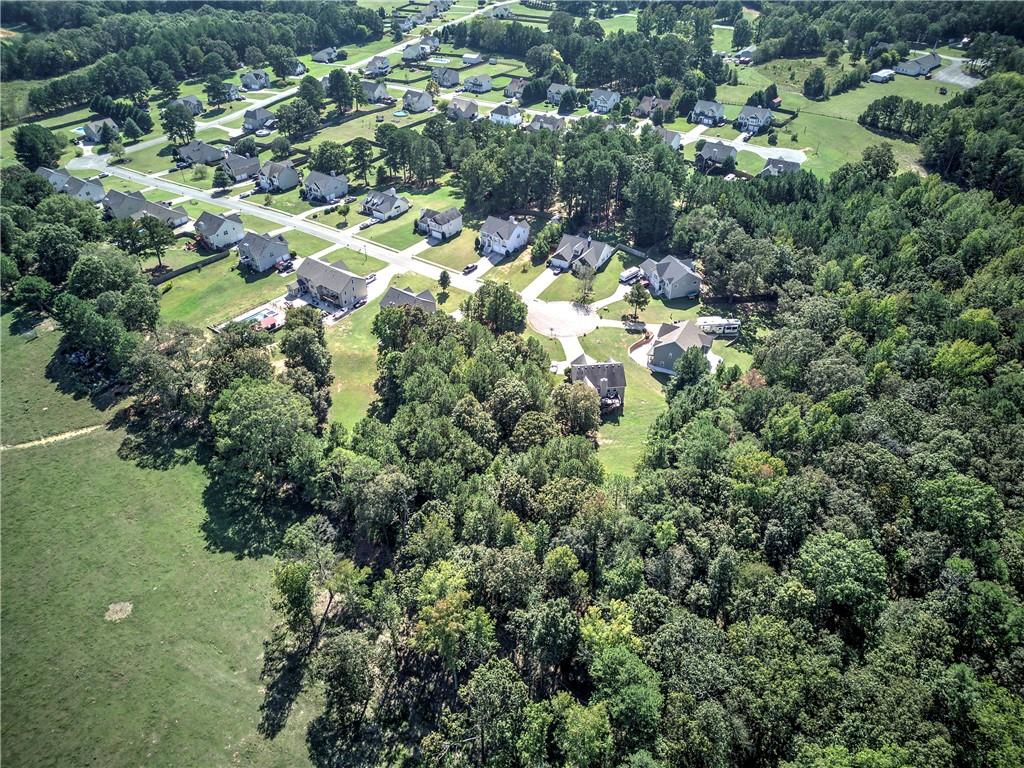 58 Ferguson Drive Euharlee, GA 30145 - Photo 14 of 16 an aerial view of residential houses with outdoor space and trees all around