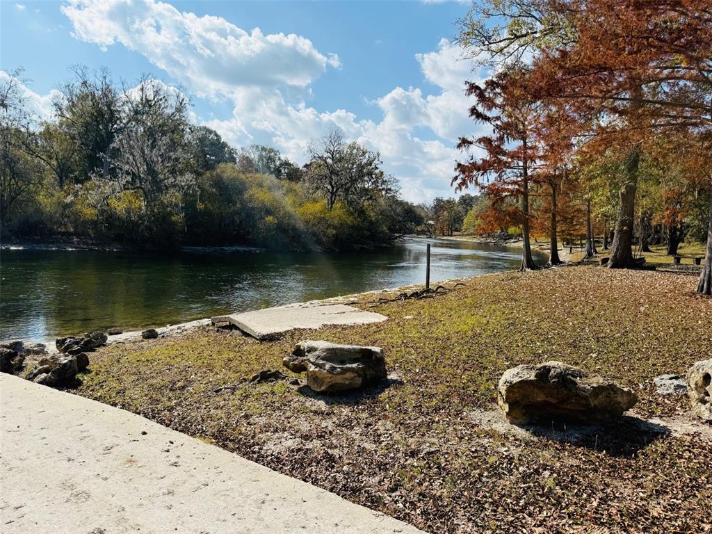 843 Southwest Central Terrace Fort White, FL 32038 - Photo 7 of 30 a view of a lake with a sink and lake view
