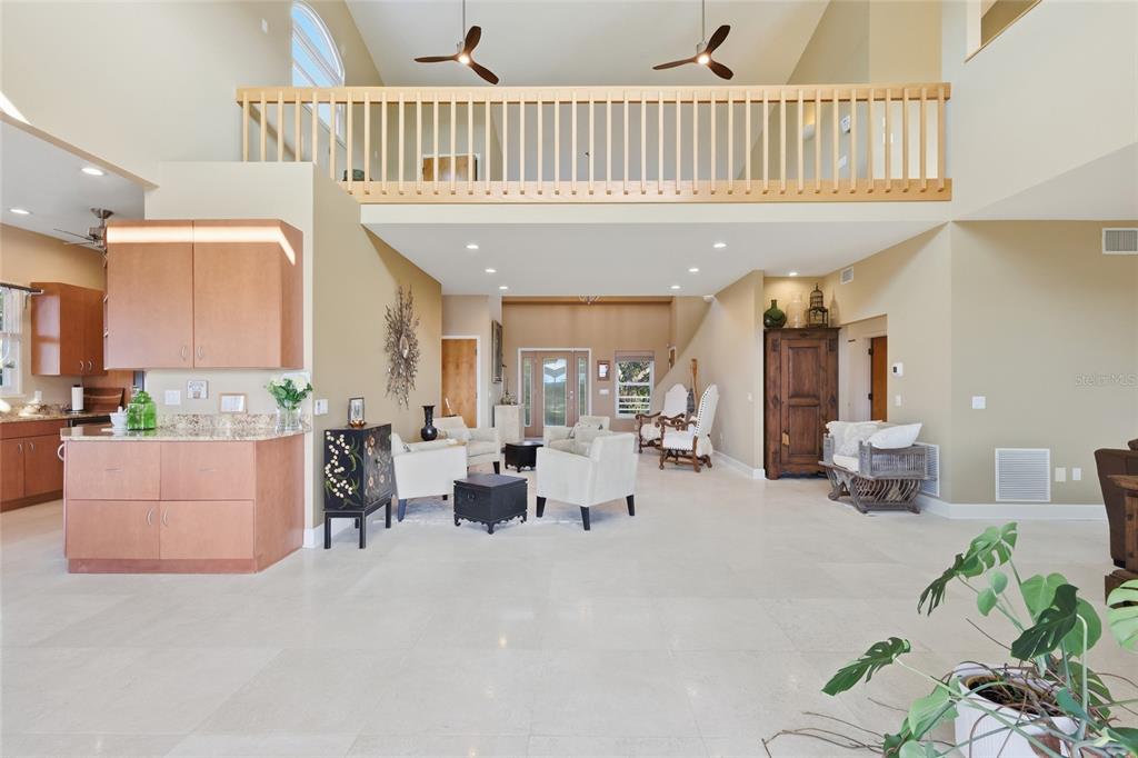 6511 Bayshore Road Palmetto, FL 34221 - Photo 18 of 53 a very nice looking living room with a large window