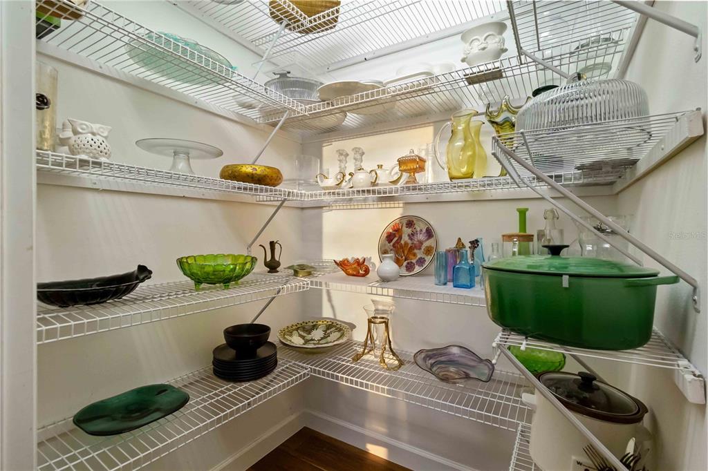 6511 Bayshore Road Palmetto, FL 34221 - Photo 22 of 53 a kitchen with a stove and a wooden floor