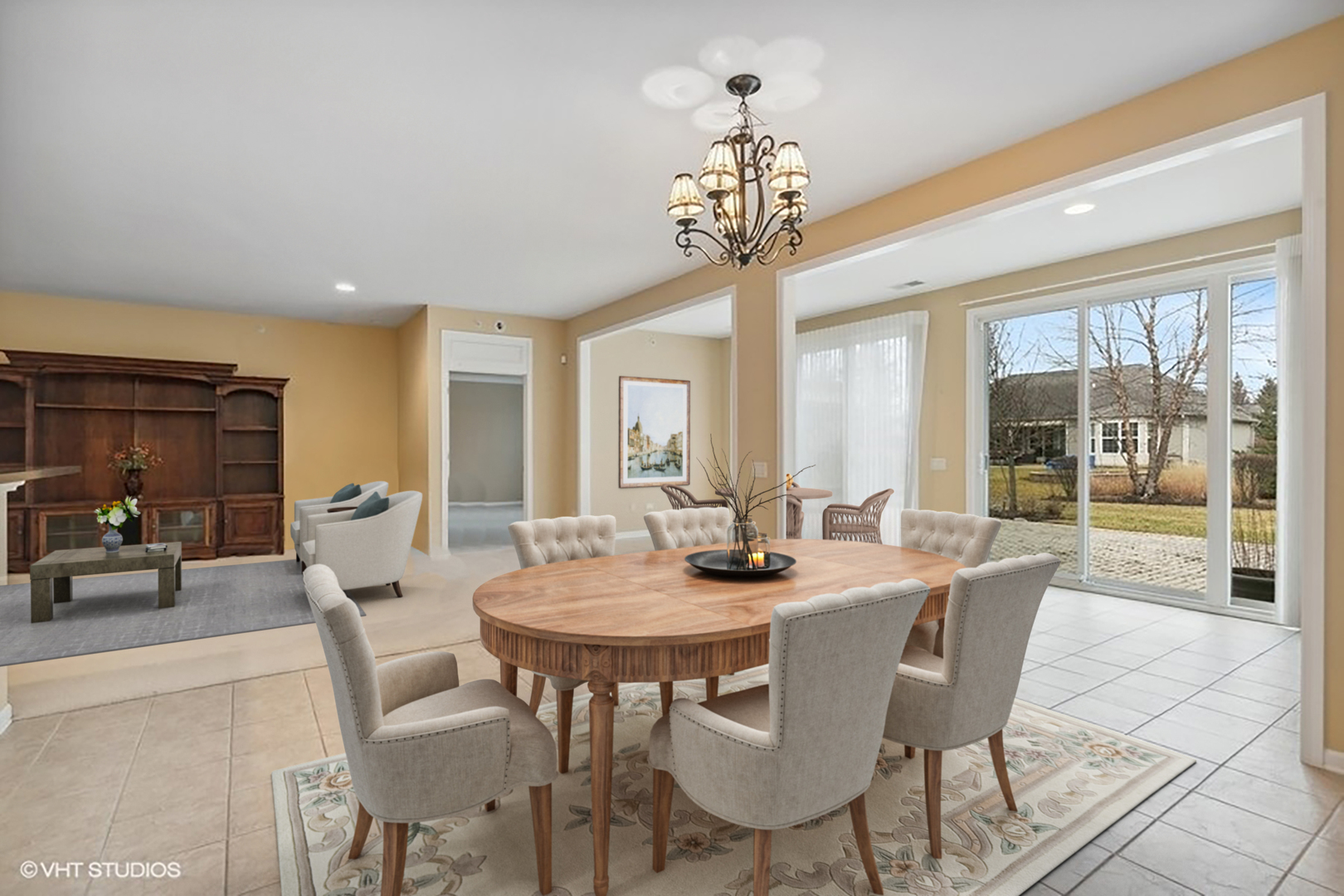 12624 Raintree Path Huntley, IL 60142 - Photo 10 of 31 a view of a dining room with furniture wooden floor and chandelier