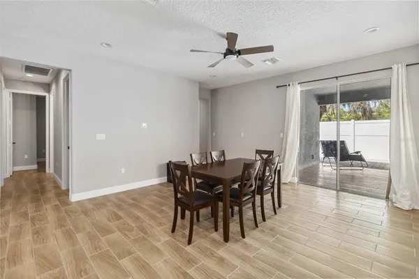 a view of a dining room with furniture