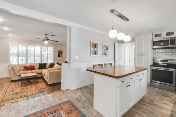 a kitchen with granite countertop lots of counter top space