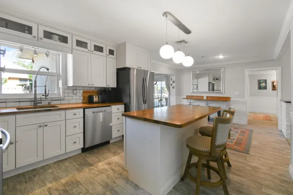 a room with furniture and a chandelier