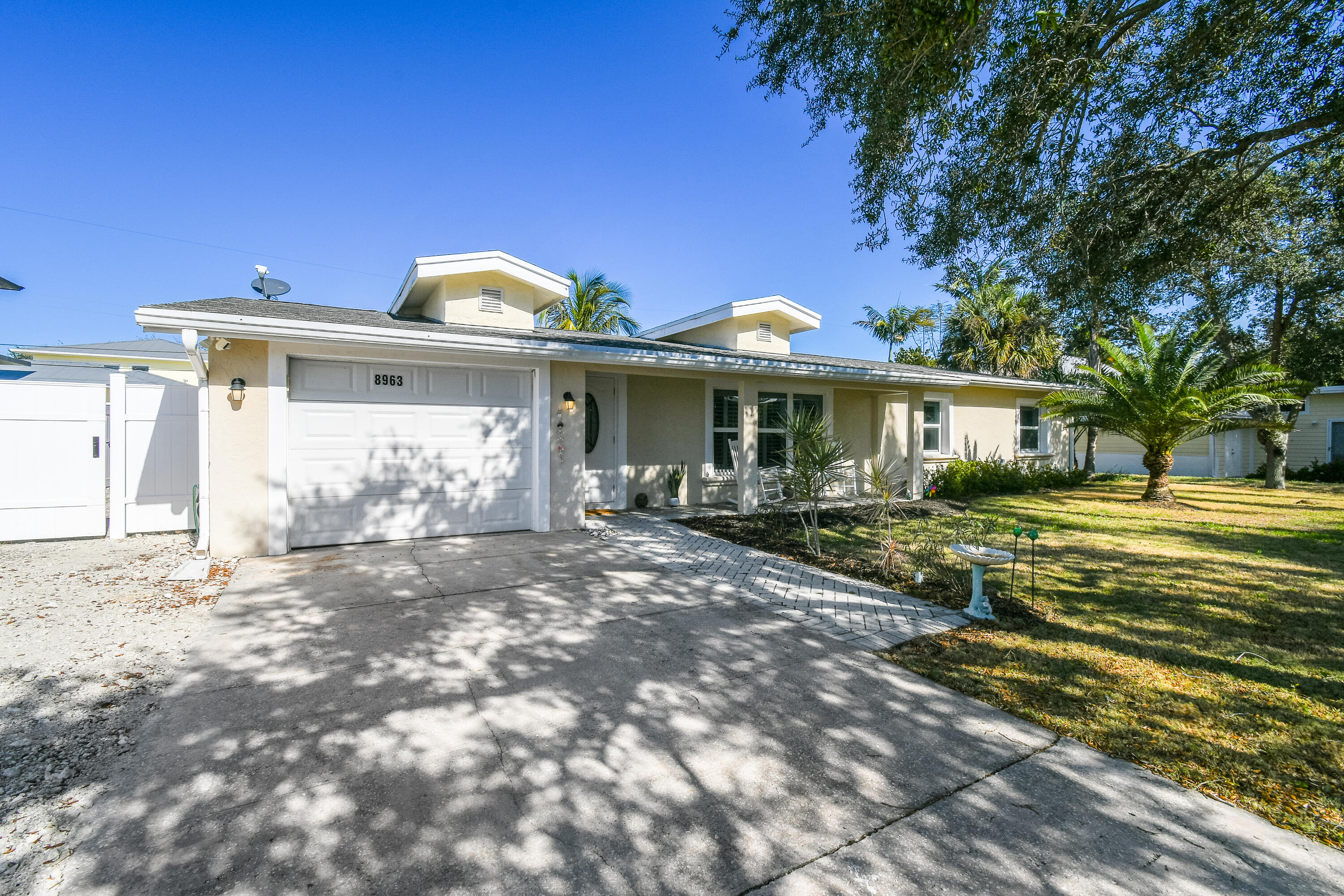 8963 Southeast Ceres Street Hobe Sound, FL 33455 - Photo 2 of 53 Front view of home