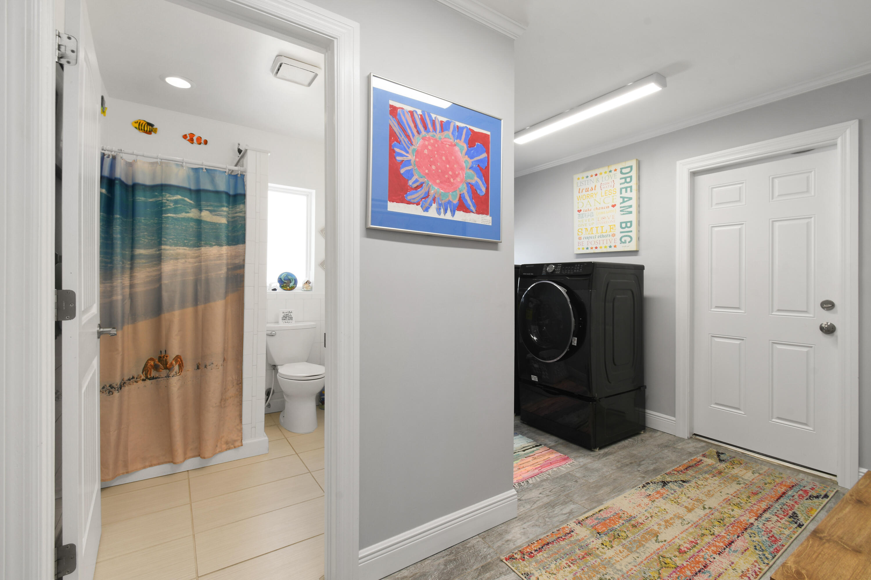 8963 Southeast Ceres Street Hobe Sound, FL 33455 - Photo 38 of 53 Bath to Laundry