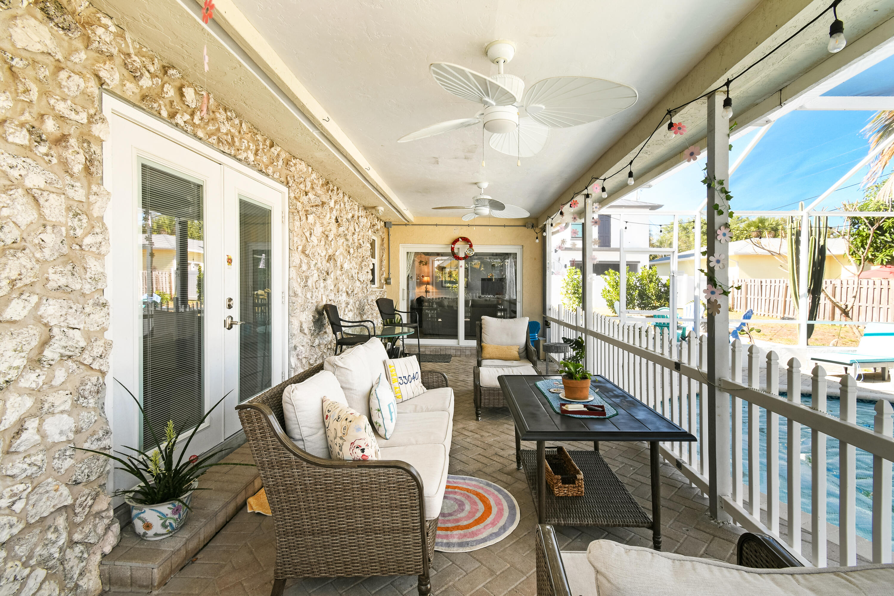 8963 Southeast Ceres Street Hobe Sound, FL 33455 - Photo 43 of 53 Back porch seating area
