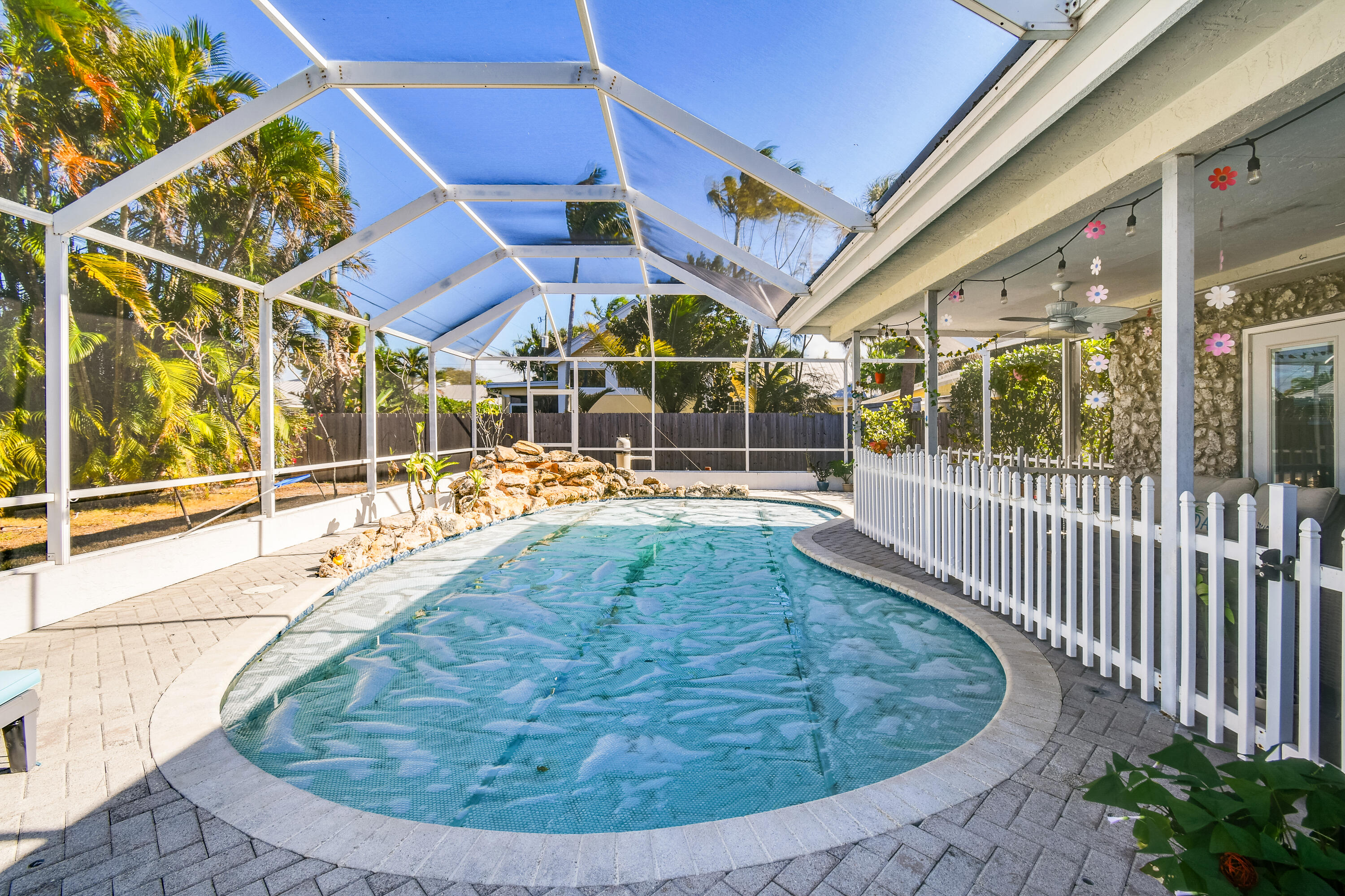 8963 Southeast Ceres Street Hobe Sound, FL 33455 - Photo 47 of 53 Pool with cover