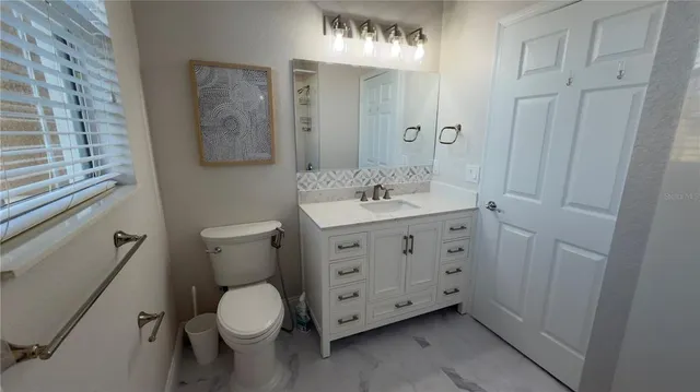 a sign on the side of a road