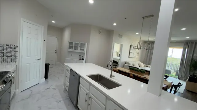 a view of a chair and table in the balcony