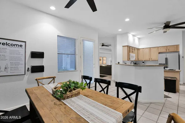 a kitchen with stainless steel appliances kitchen island granite countertop a sink and cabinets