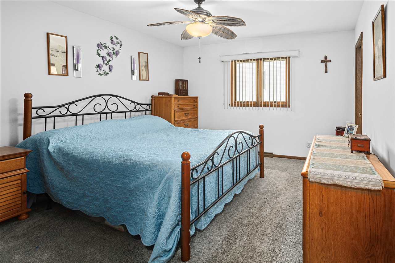 1947 Baintree Road Lake Summerset, IL 61019 - Photo 17 of 53 a bedroom with furniture and a window