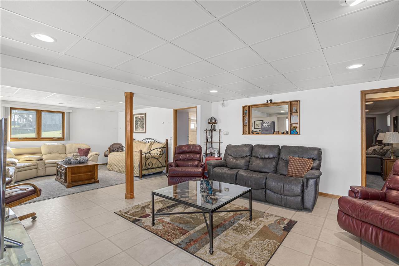 1947 Baintree Road Lake Summerset, IL 61019 - Photo 20 of 53 a living room with furniture and a large window
