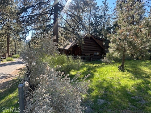 0 Twin Lakes Road Wrightwood, CA 92397 - Photo 6 of 9 a backyard of a house with lots of green space