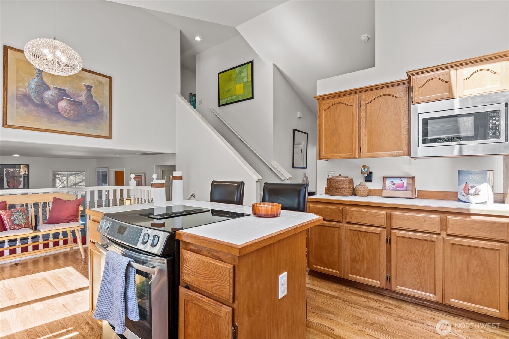 2414 Kennewick Place Northeast Renton, WA 98056 - Photo 11 of 40 a kitchen that has a sink and a stove in it