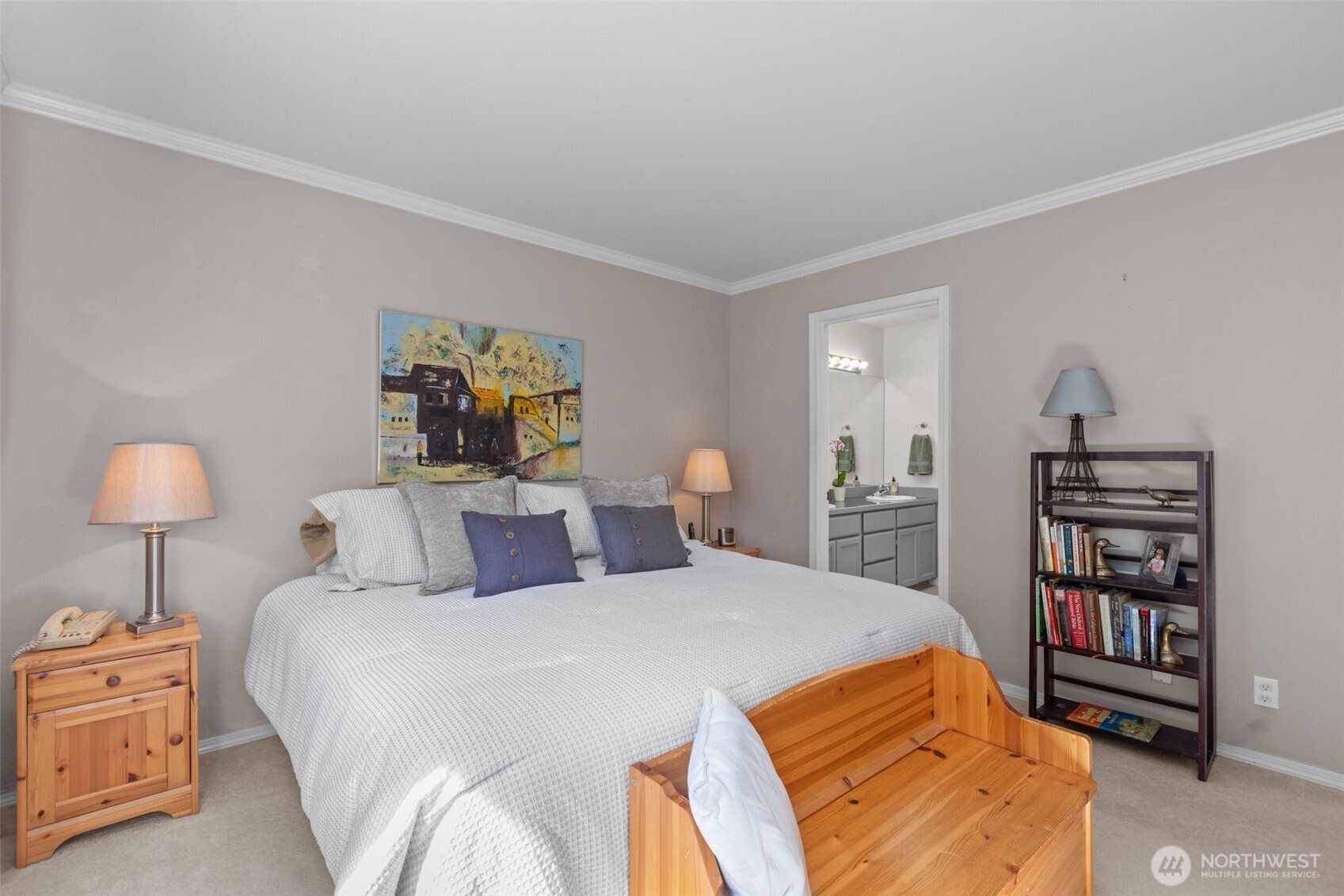 2414 Kennewick Place Northeast Renton, WA 98056 - Photo 19 of 40 a bedroom with a bed and a lamp