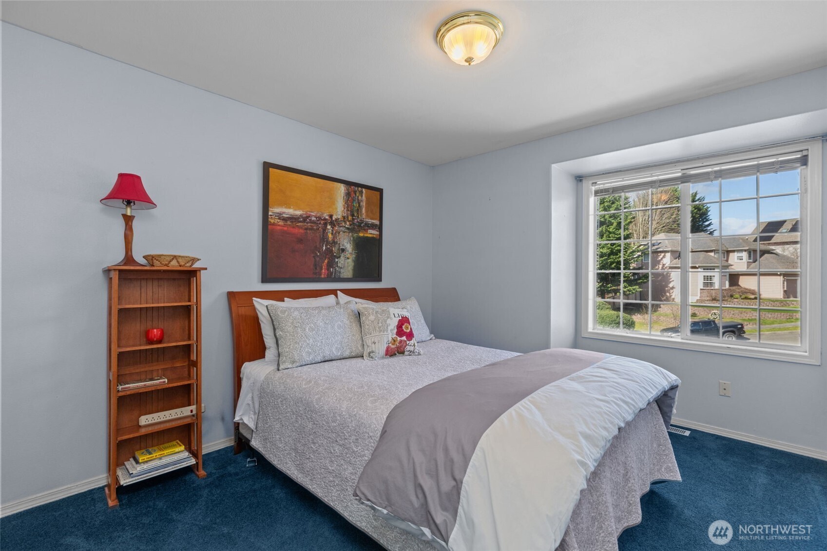 2414 Kennewick Place Northeast Renton, WA 98056 - Photo 26 of 40 a bedroom with a bed and a window