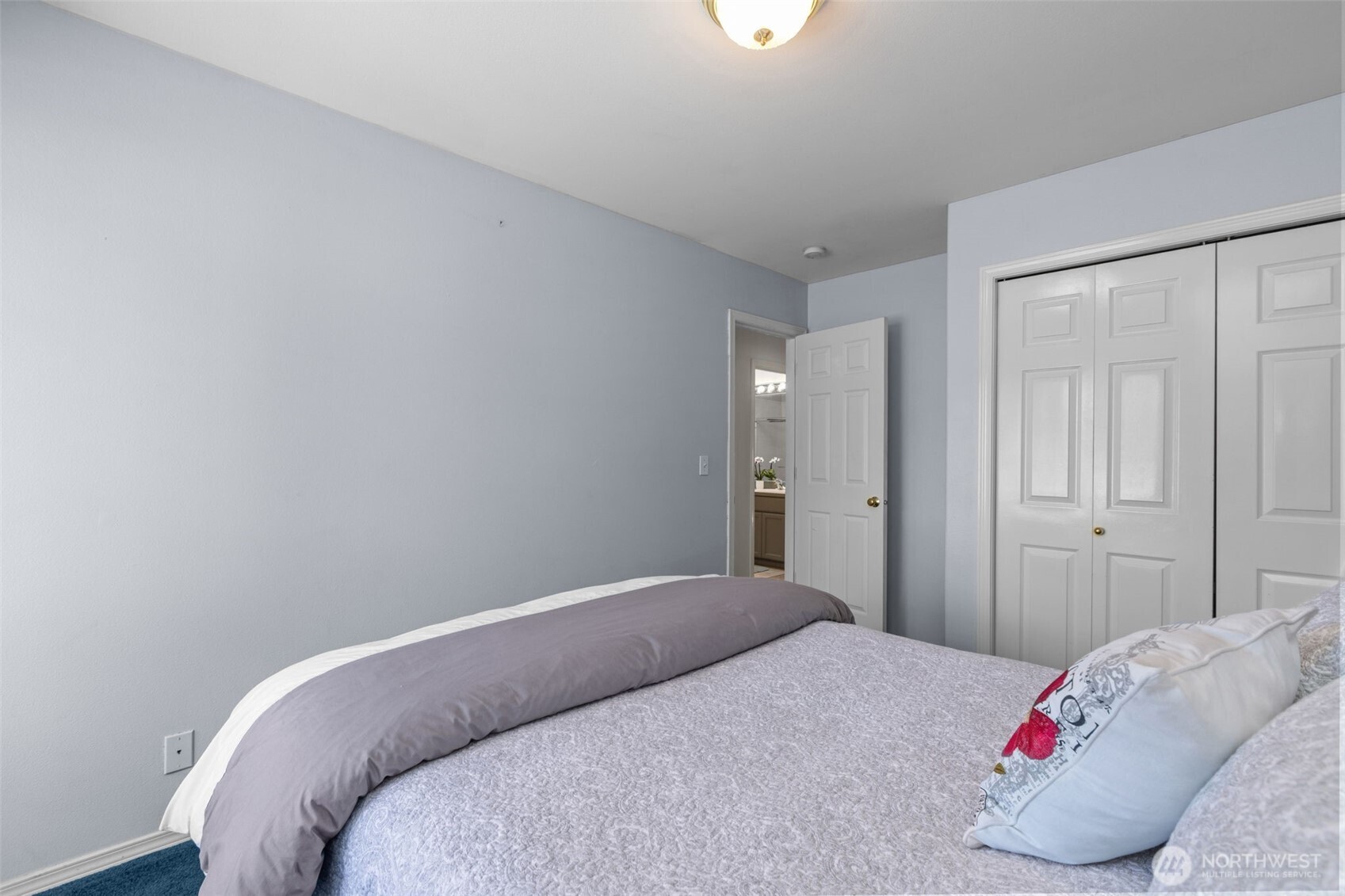 2414 Kennewick Place Northeast Renton, WA 98056 - Photo 27 of 40 a bedroom with a bed and a window