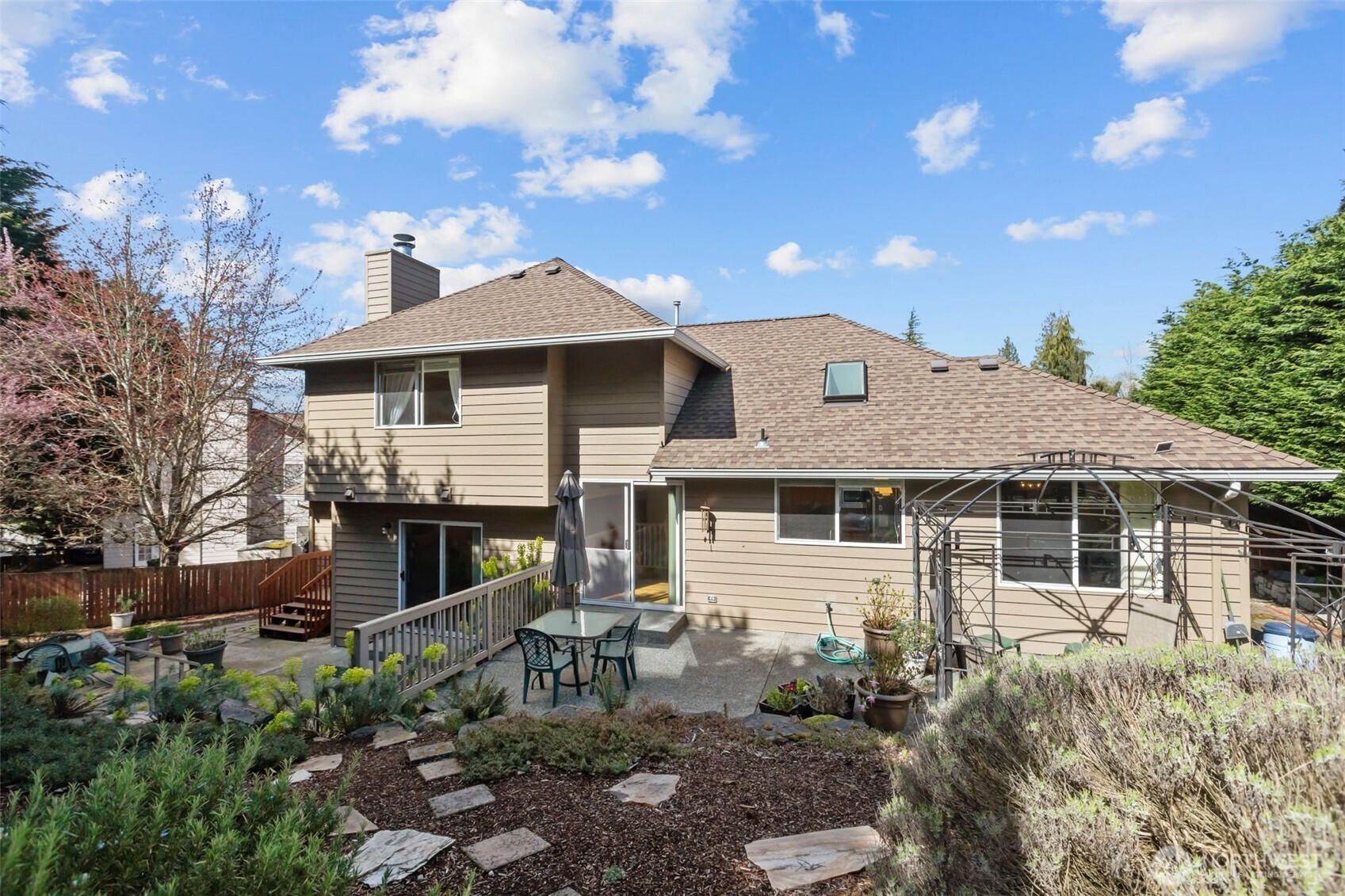 2414 Kennewick Place Northeast Renton, WA 98056 - Photo 33 of 40 a front view of a house with yard and green space