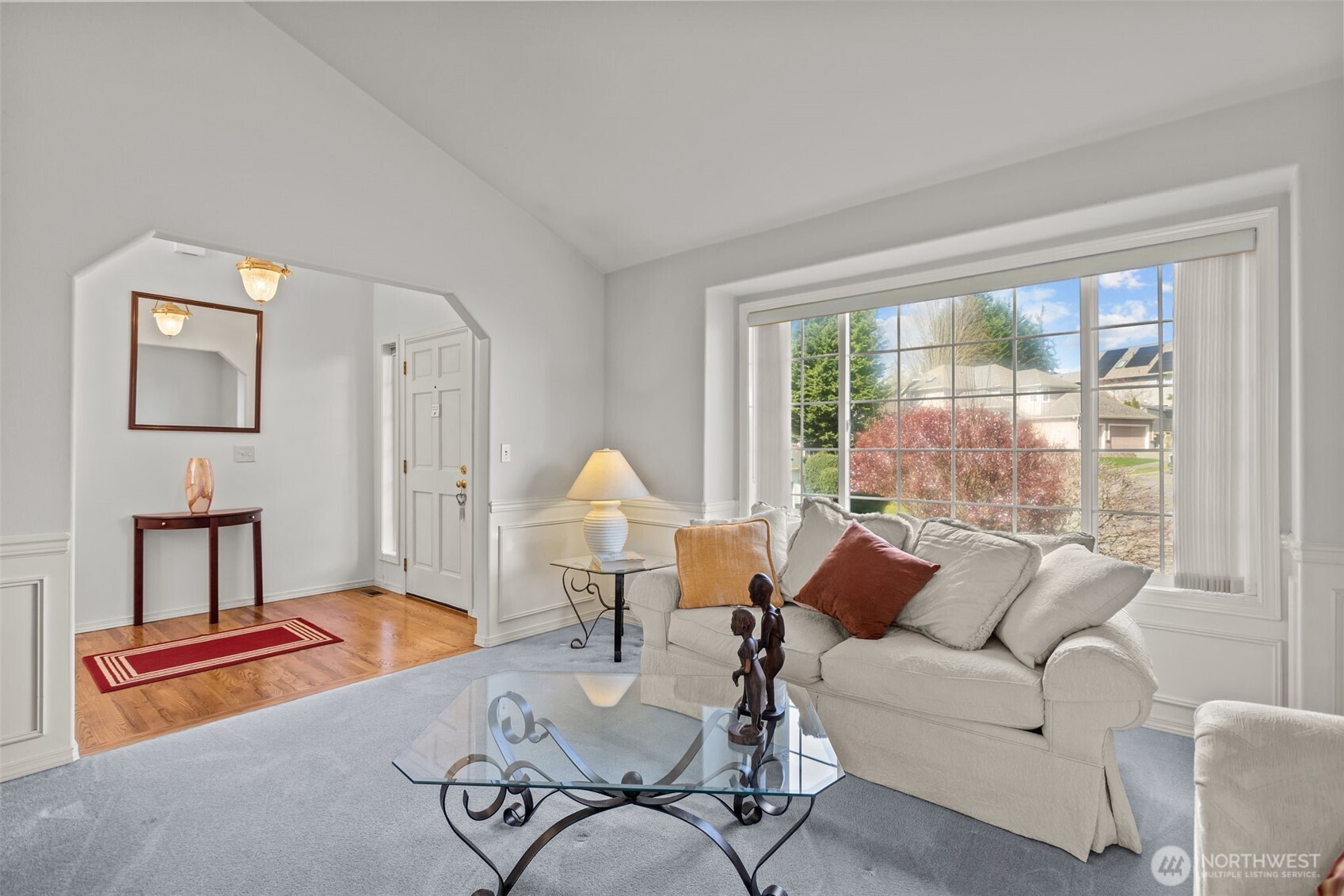 2414 Kennewick Place Northeast Renton, WA 98056 - Photo 4 of 40 a living room with furniture and a large window