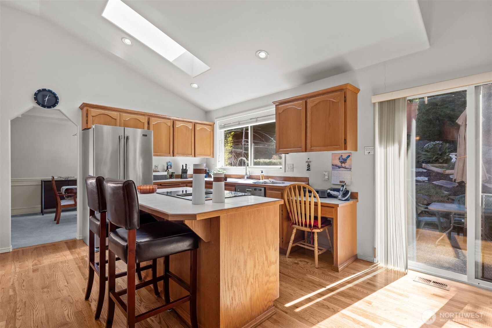 2414 Kennewick Place Northeast Renton, WA 98056 - Photo 7 of 40 a kitchen with a table and chairs in it
