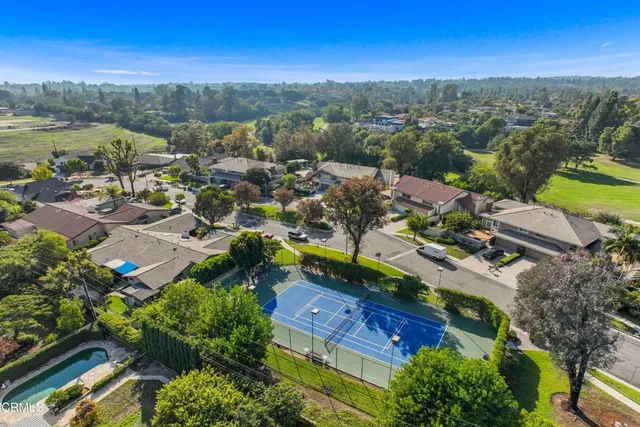 an aerial view of a house with a garden