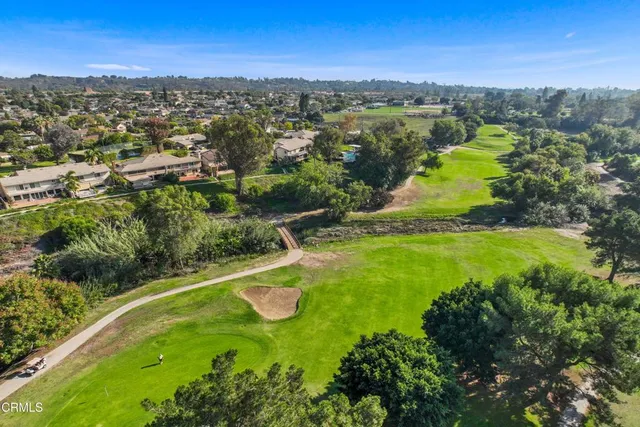 a view of a lake with a city