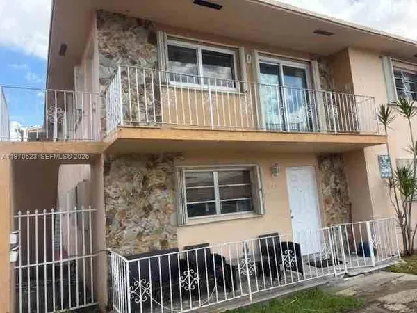 a front view of a house with a porch