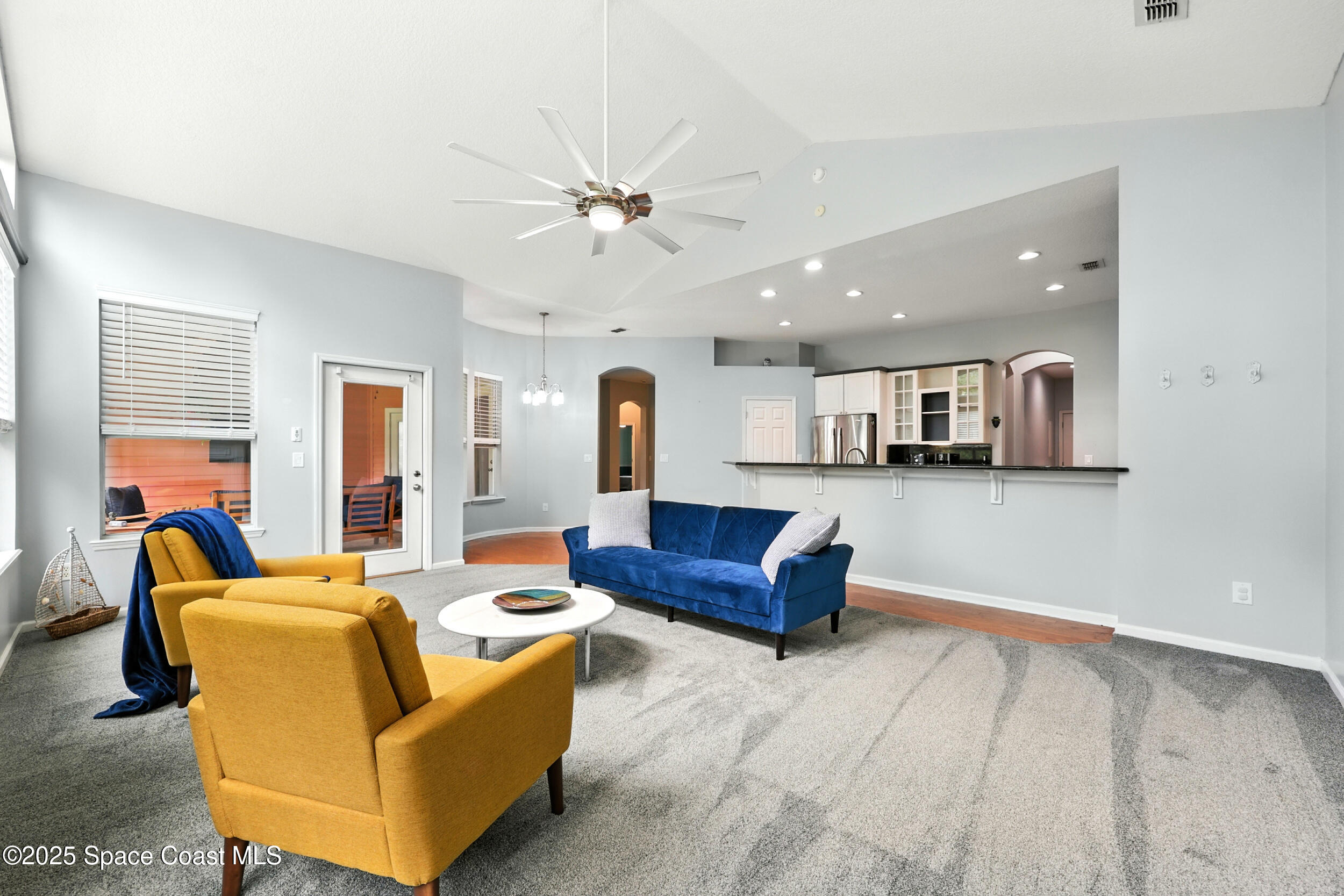 2560 Benjamin Road Jacksonville, FL 32223 - Photo 11 of 48 a living room with furniture and kitchen view