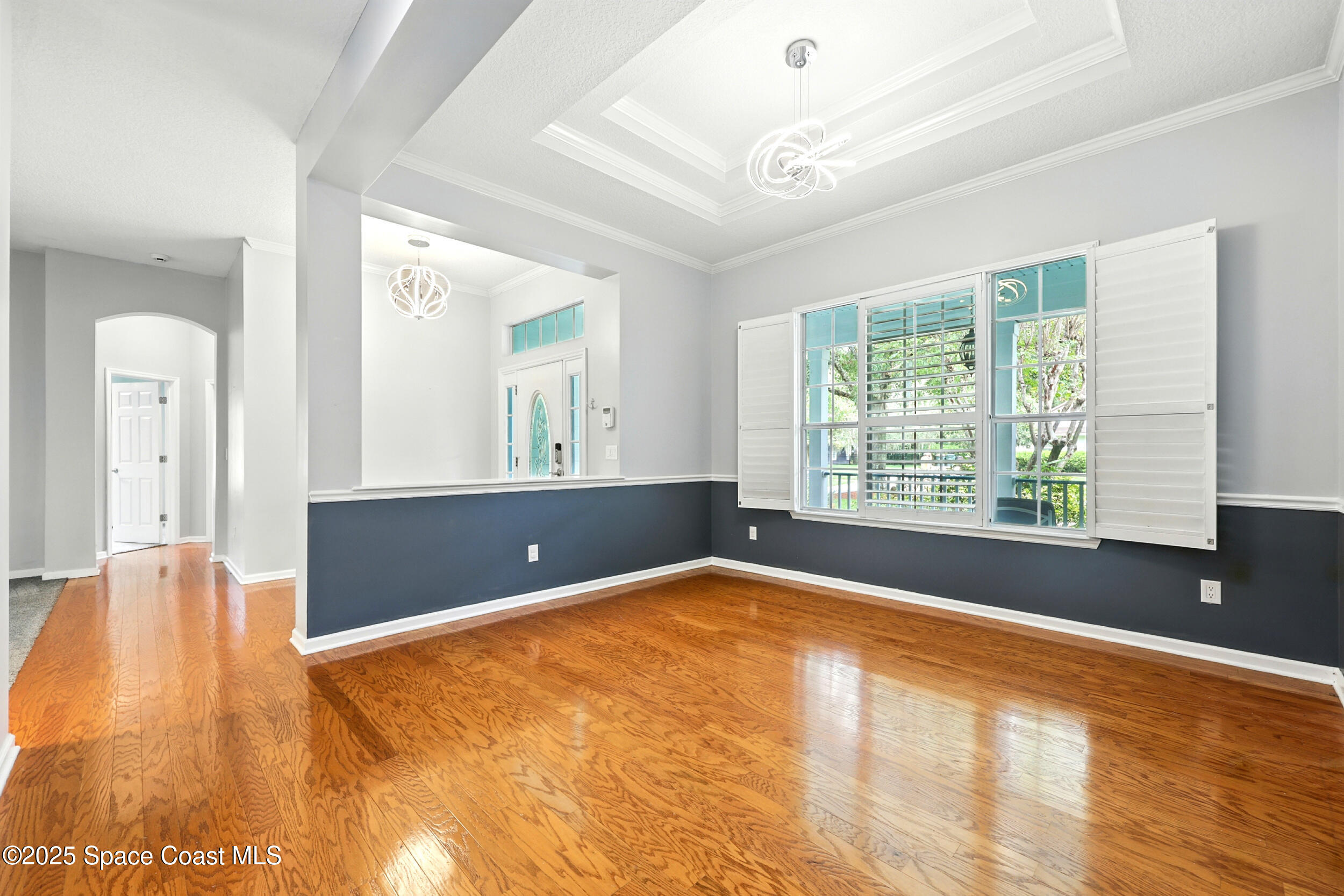 2560 Benjamin Road Jacksonville, FL 32223 - Photo 13 of 48 a view of an empty room with window and a kitchen