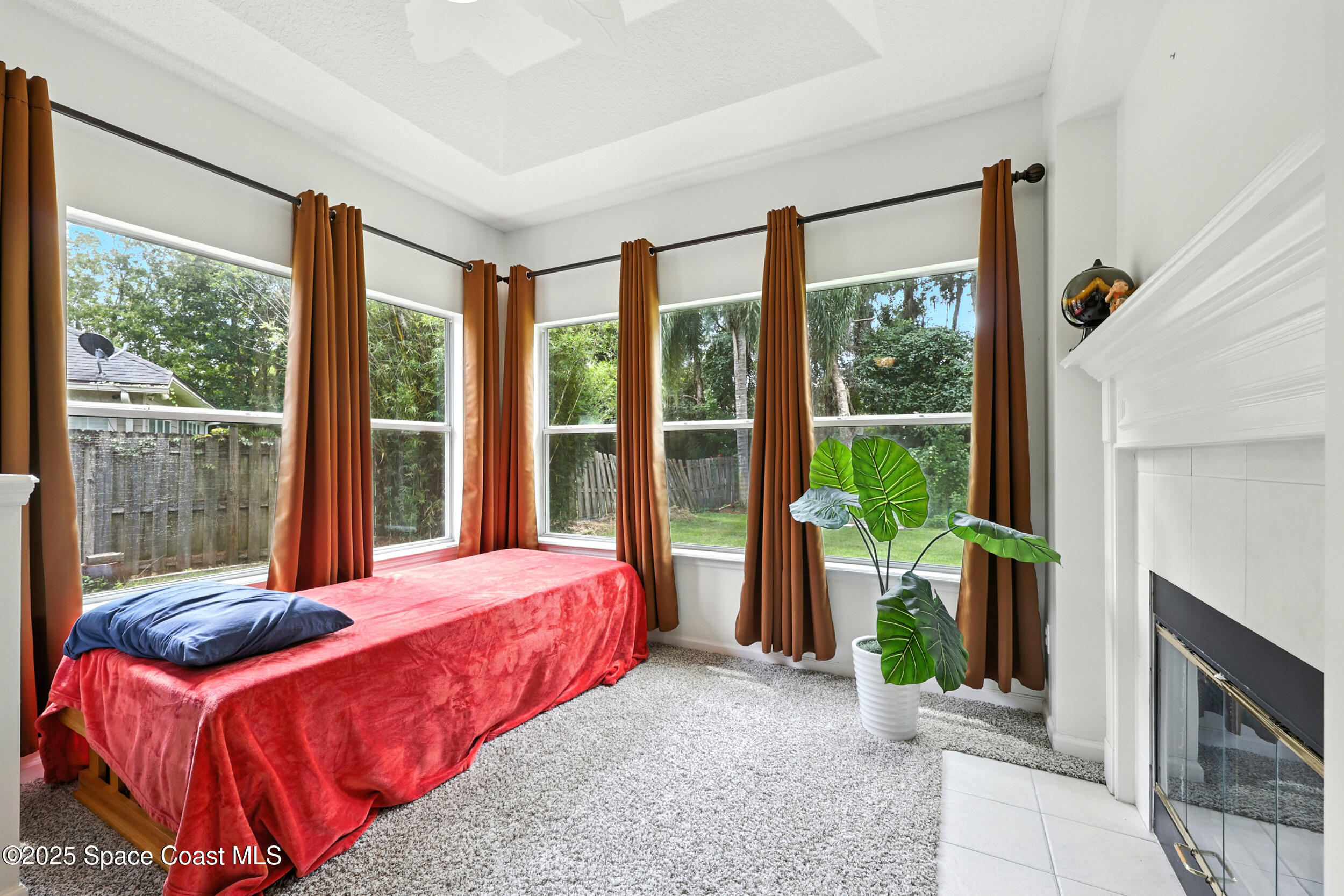 2560 Benjamin Road Jacksonville, FL 32223 - Photo 24 of 48 a bedroom with a bed and a large window