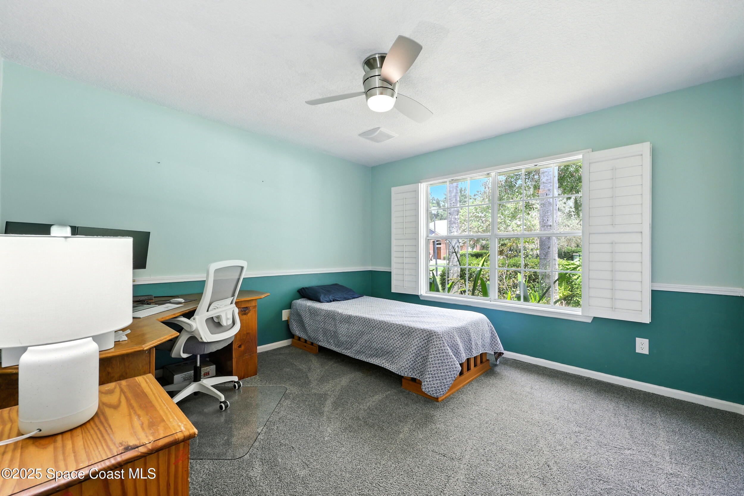 2560 Benjamin Road Jacksonville, FL 32223 - Photo 30 of 48 a bed room with a bed and a window