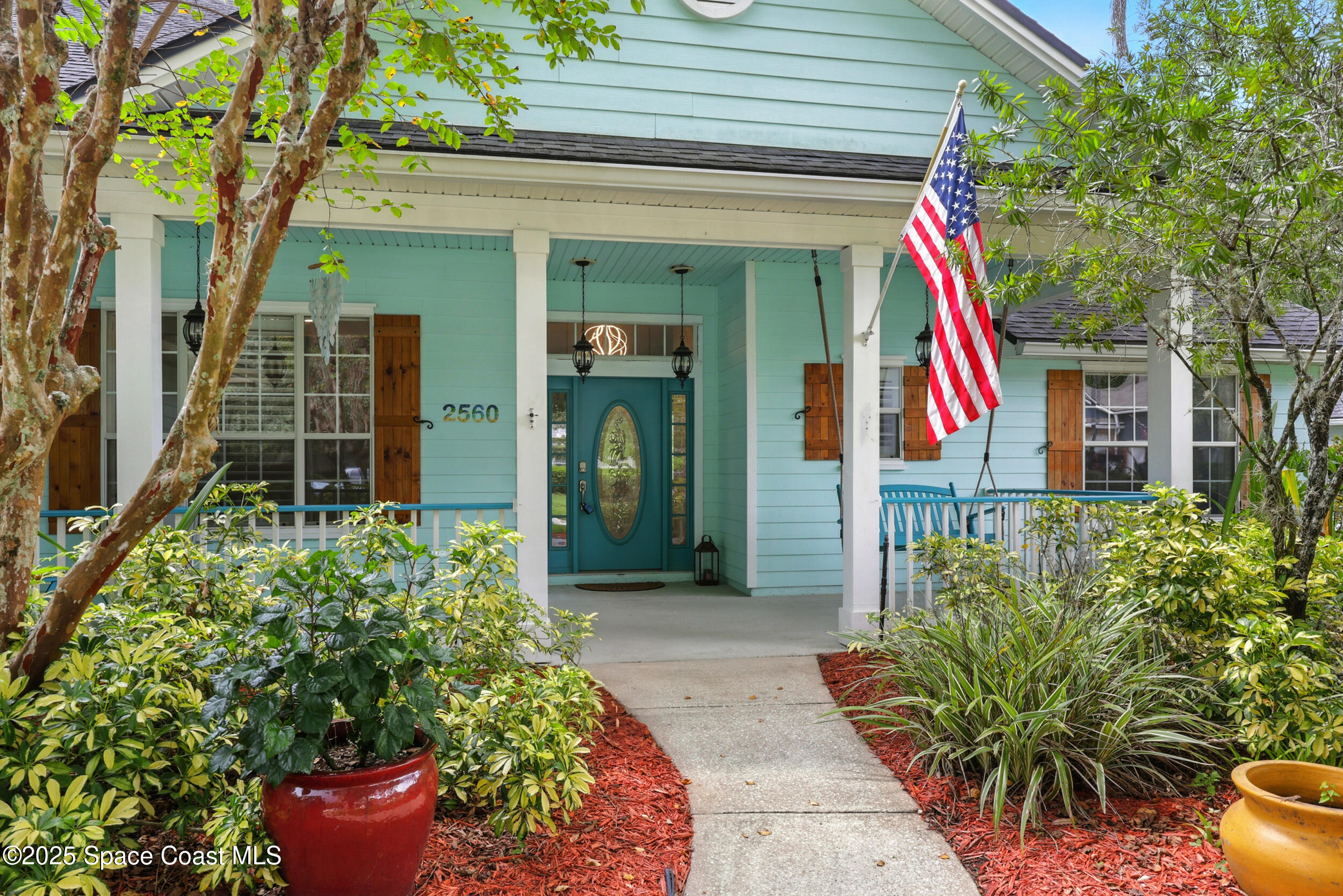 2560 Benjamin Road Jacksonville, FL 32223 - Photo 3 of 48 a front view of a house with entryway