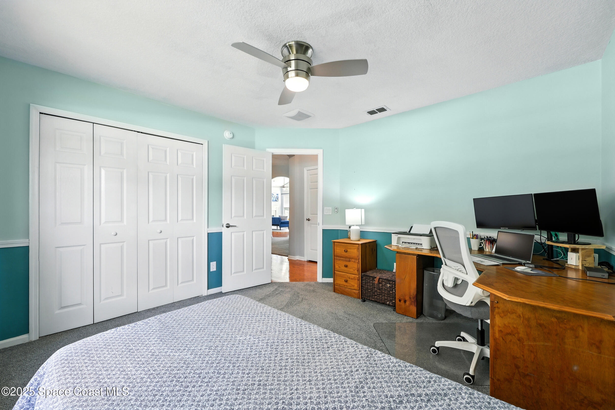 2560 Benjamin Road Jacksonville, FL 32223 - Photo 31 of 48 a bedroom with a workspace
