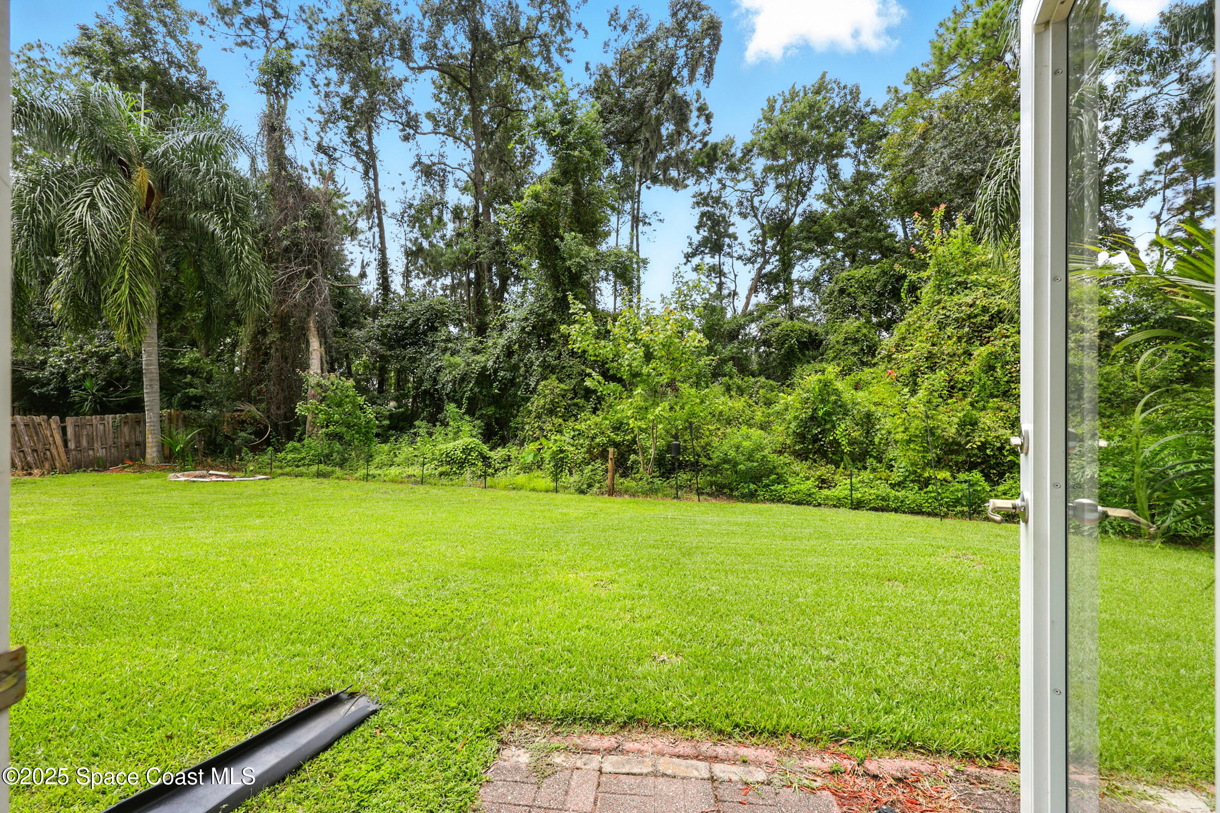 2560 Benjamin Road Jacksonville, FL 32223 - Photo 41 of 48 a view of a field with a tree