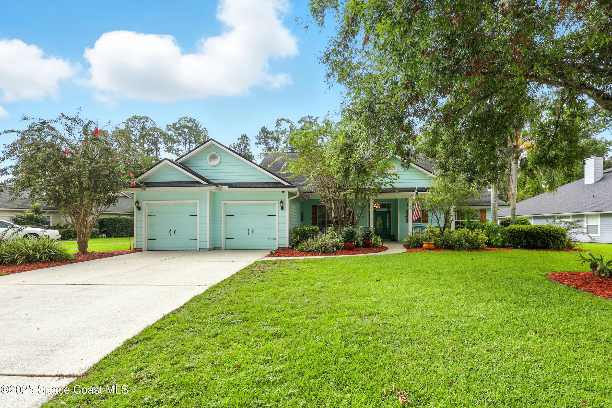 2560 Benjamin Road Jacksonville, FL 32223 - Photo 46 of 48 a front view of a house with garden