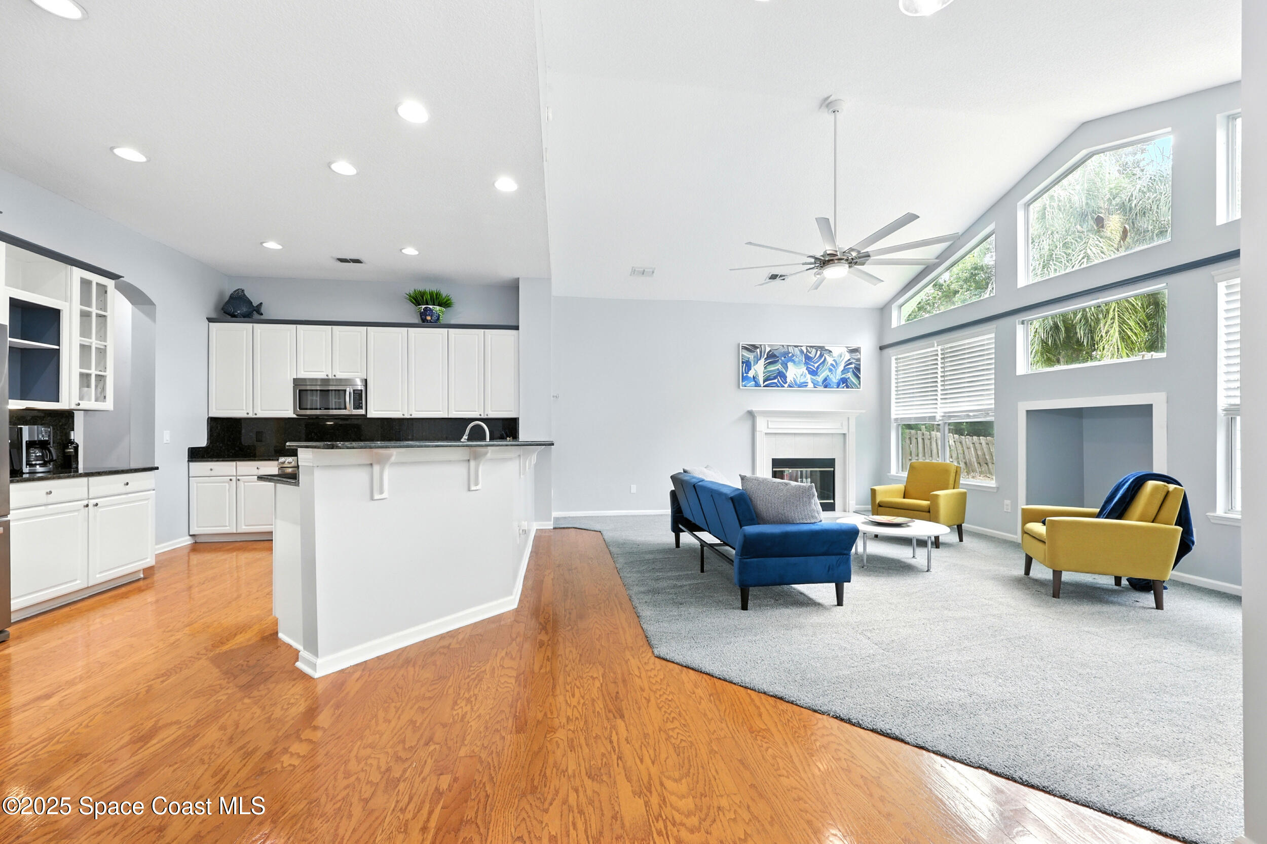 2560 Benjamin Road Jacksonville, FL 32223 - Photo 9 of 48 a living room with furniture and a fireplace