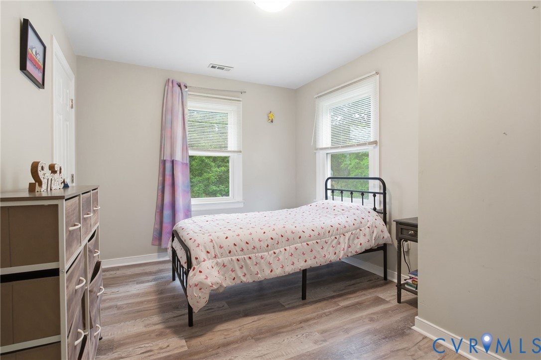 9110 Gayton Road Henrico, VA 23229 - Photo 29 of 54 a bedroom with a bed and a window