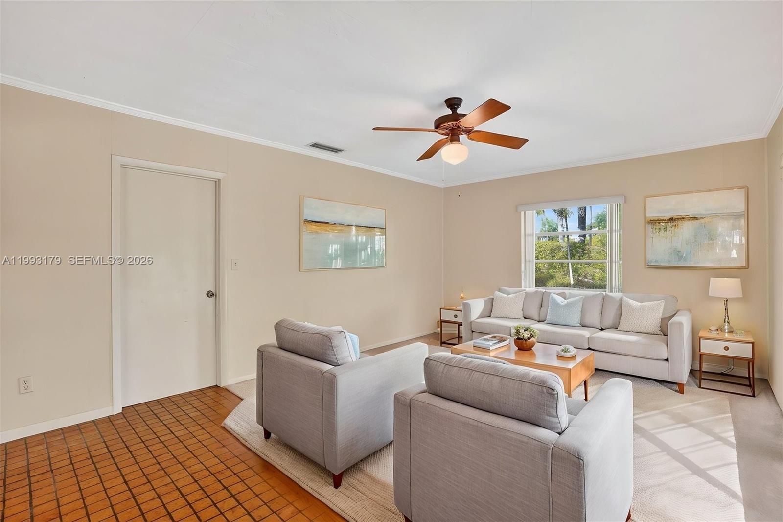 10753 Southwest 118th Street Miami, FL 33176 - Photo 16 of 51 a living room with furniture and a window