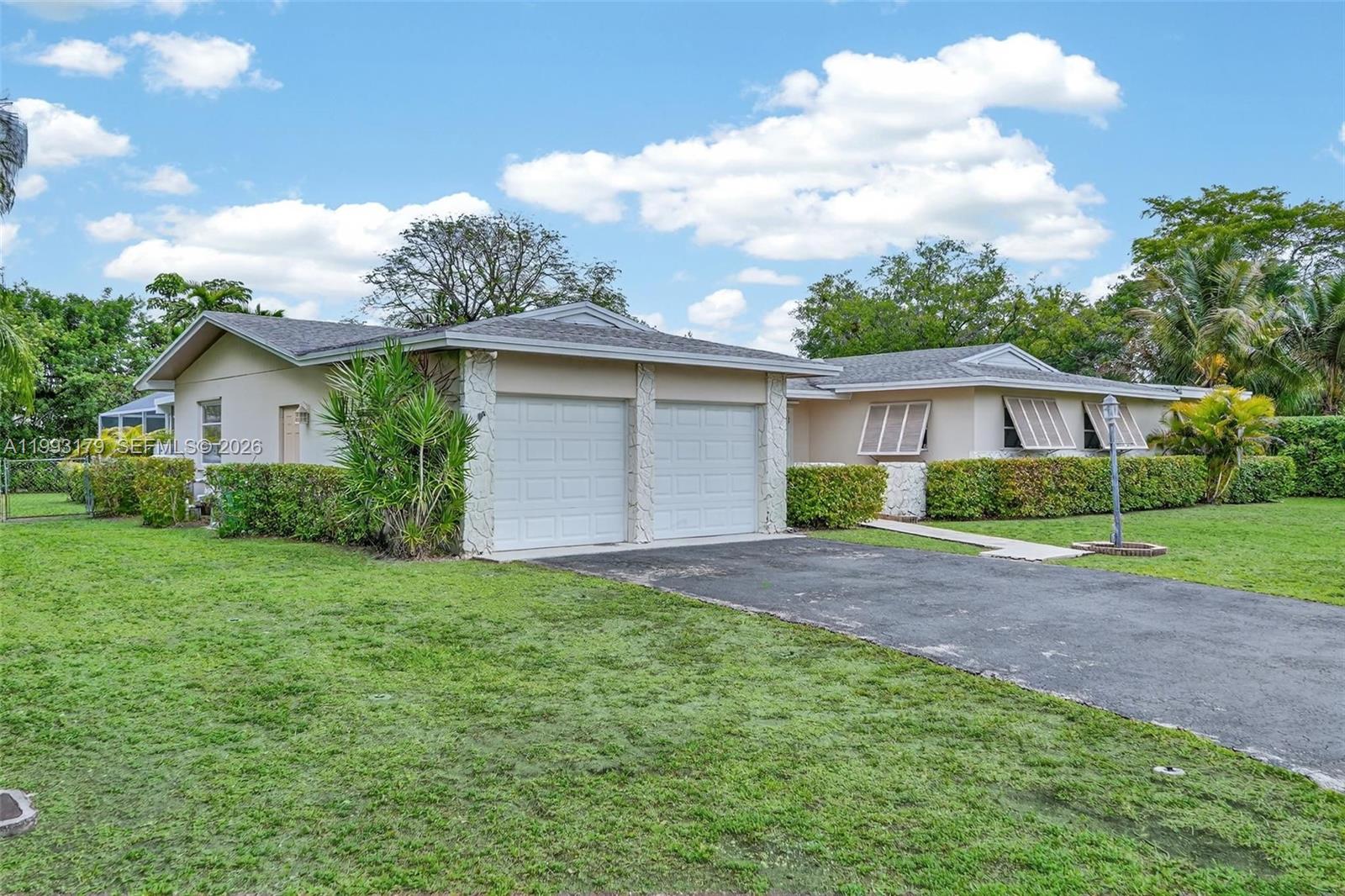 10753 Southwest 118th Street Miami, FL 33176 - Photo 2 of 51 a view of backyard with green space