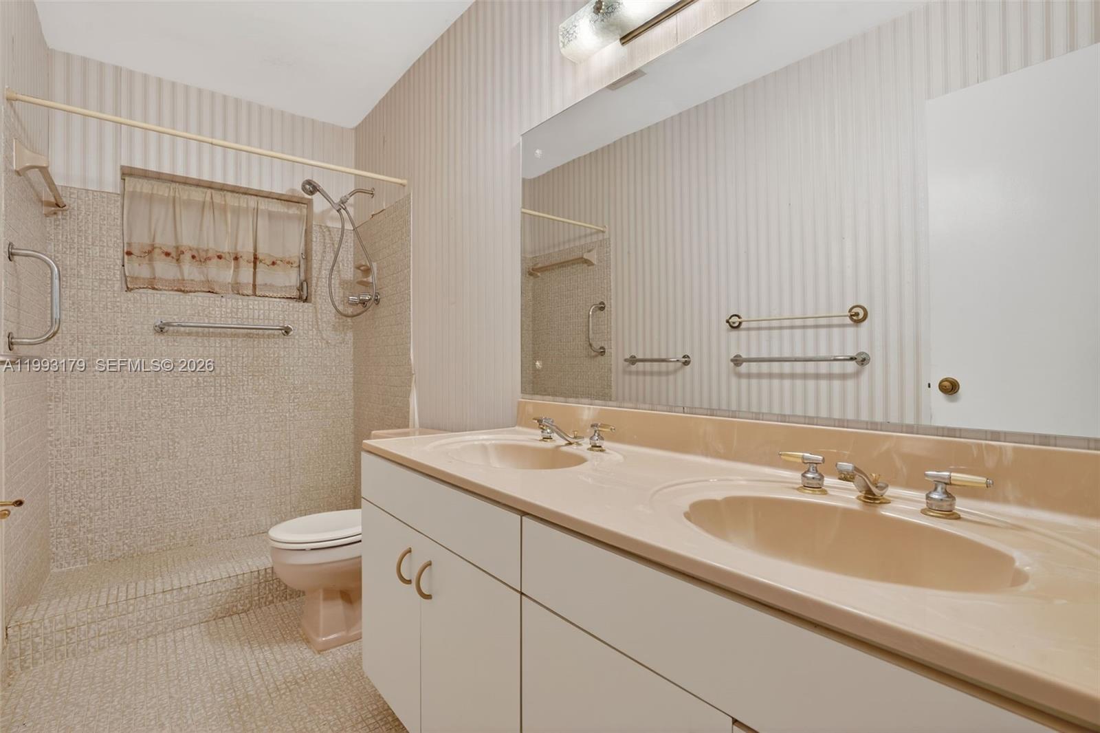 10753 Southwest 118th Street Miami, FL 33176 - Photo 22 of 51 a bathroom with a sink and a toilet