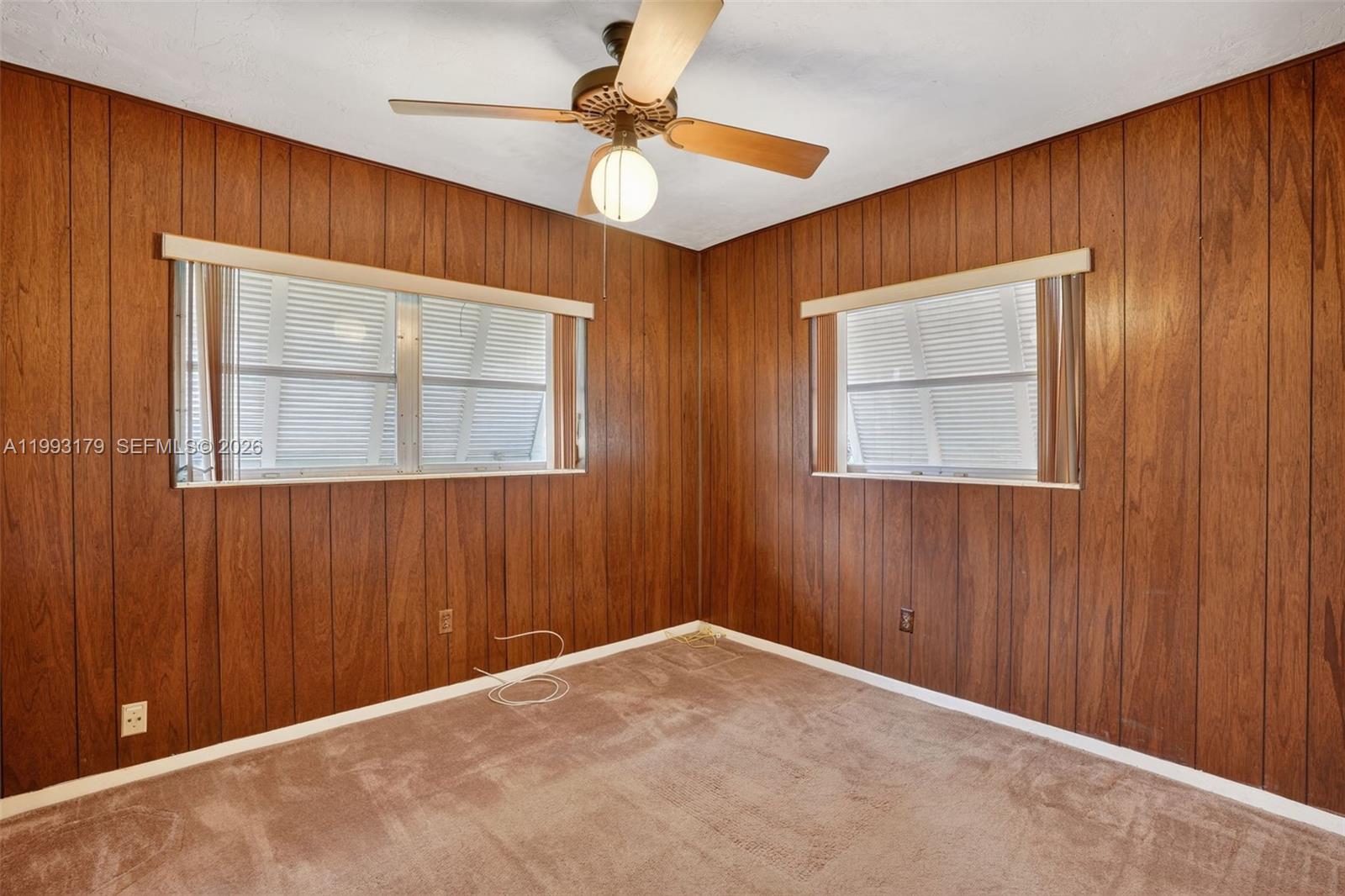 10753 Southwest 118th Street Miami, FL 33176 - Photo 23 of 51 a view of an empty room with a window