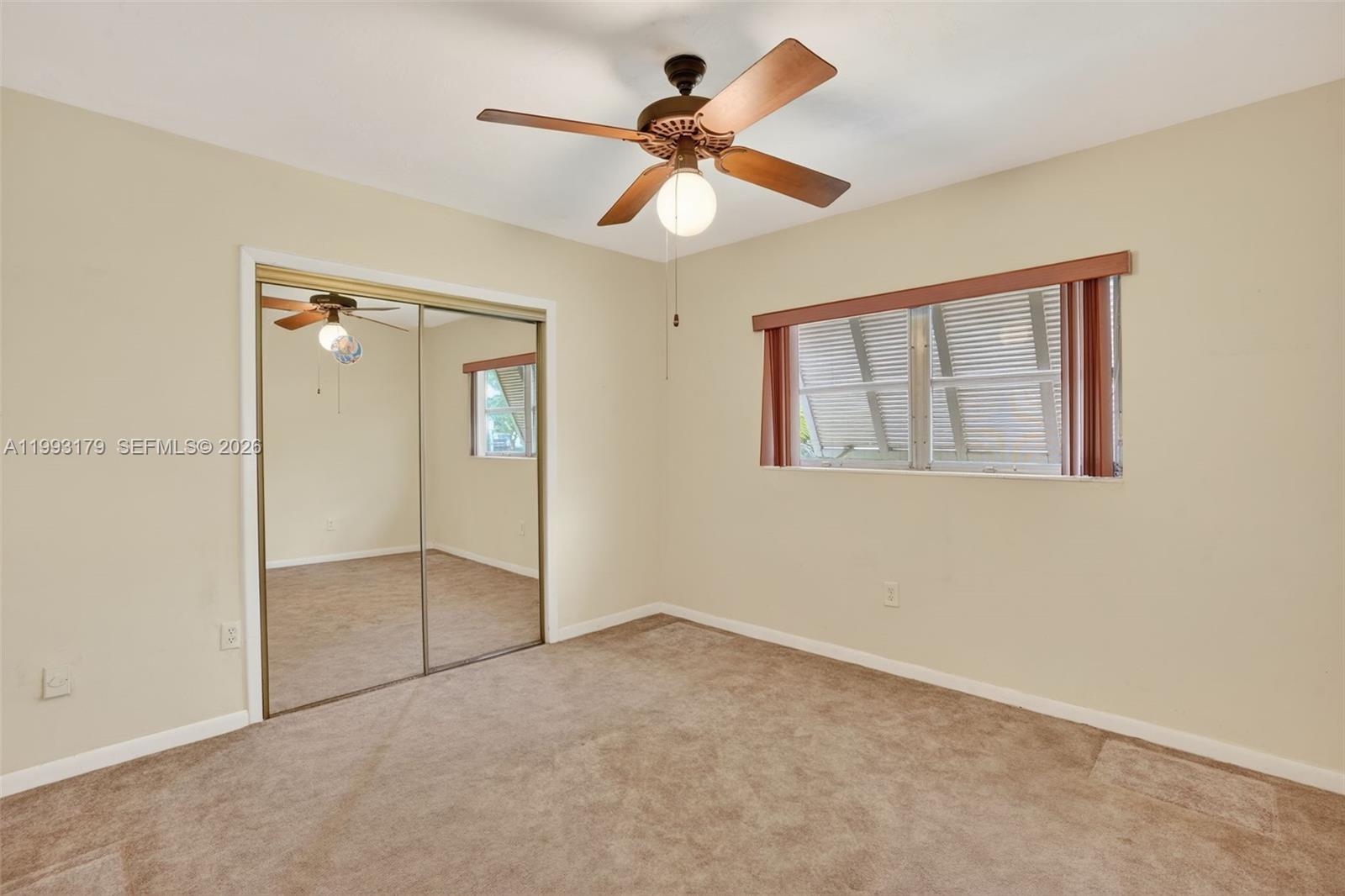 10753 Southwest 118th Street Miami, FL 33176 - Photo 26 of 51 a view of an empty room with a window