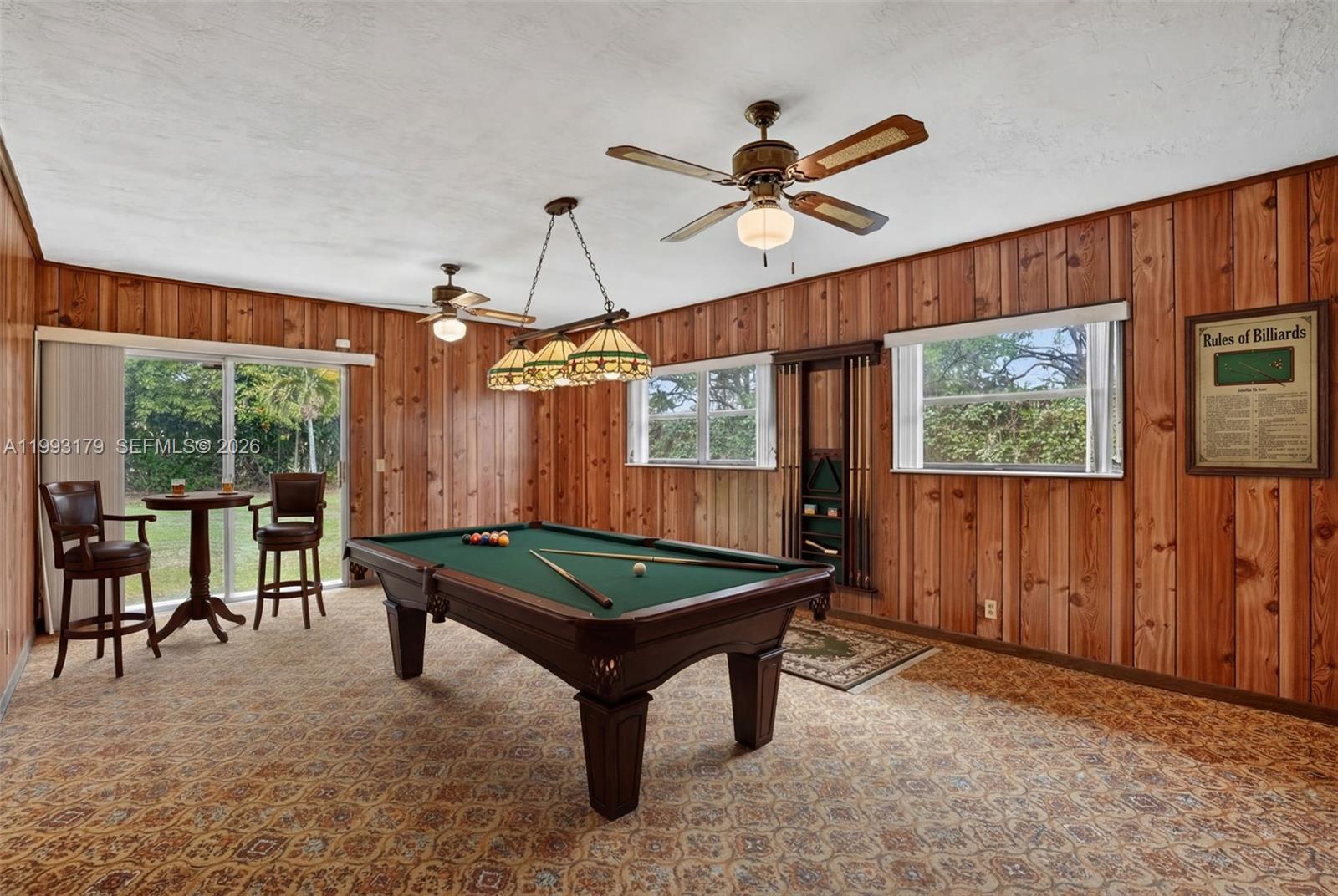 10753 Southwest 118th Street Miami, FL 33176 - Photo 31 of 51 a room with pool table and windows