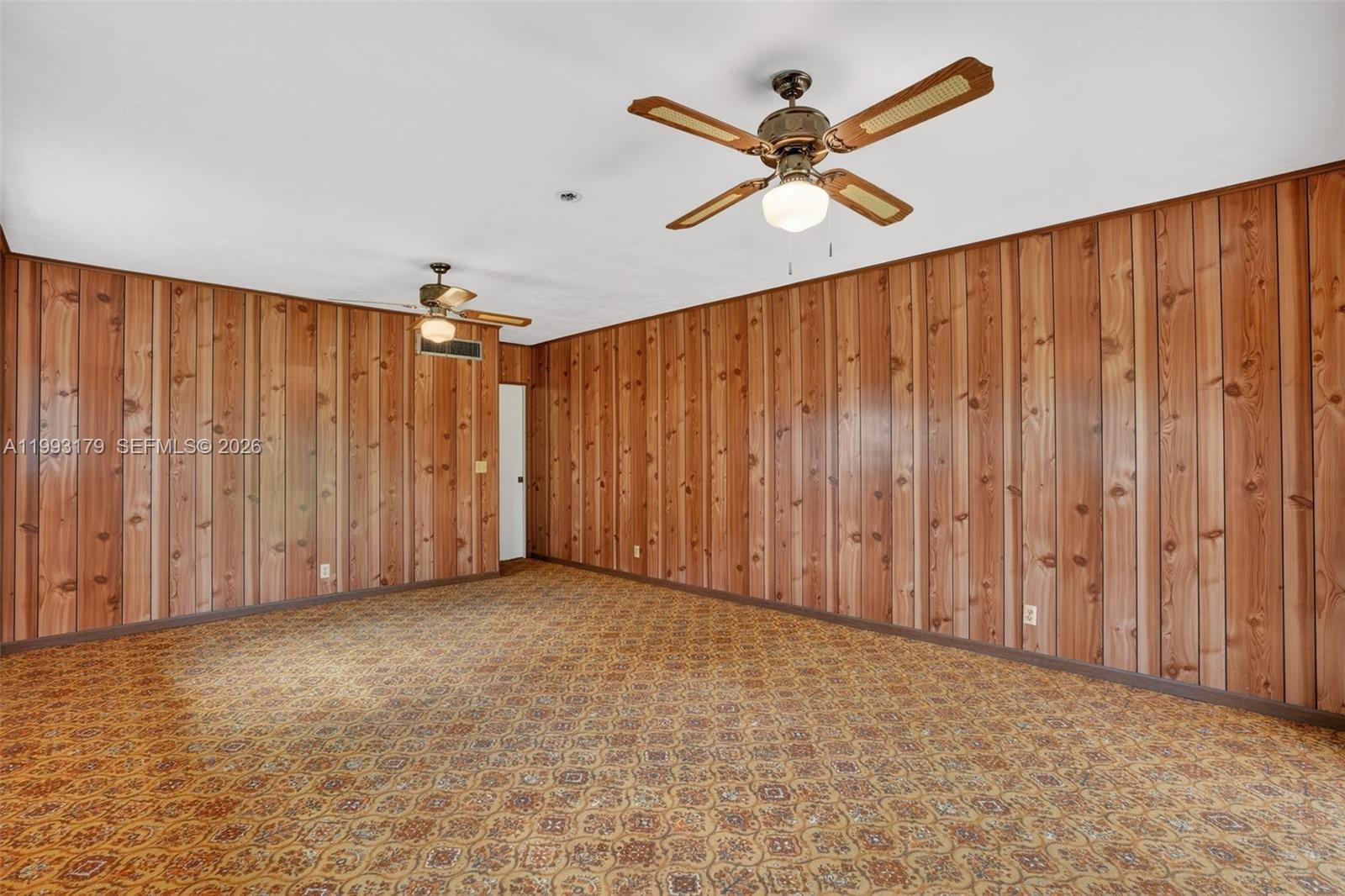 10753 Southwest 118th Street Miami, FL 33176 - Photo 32 of 51 a view of a big room with wooden walls