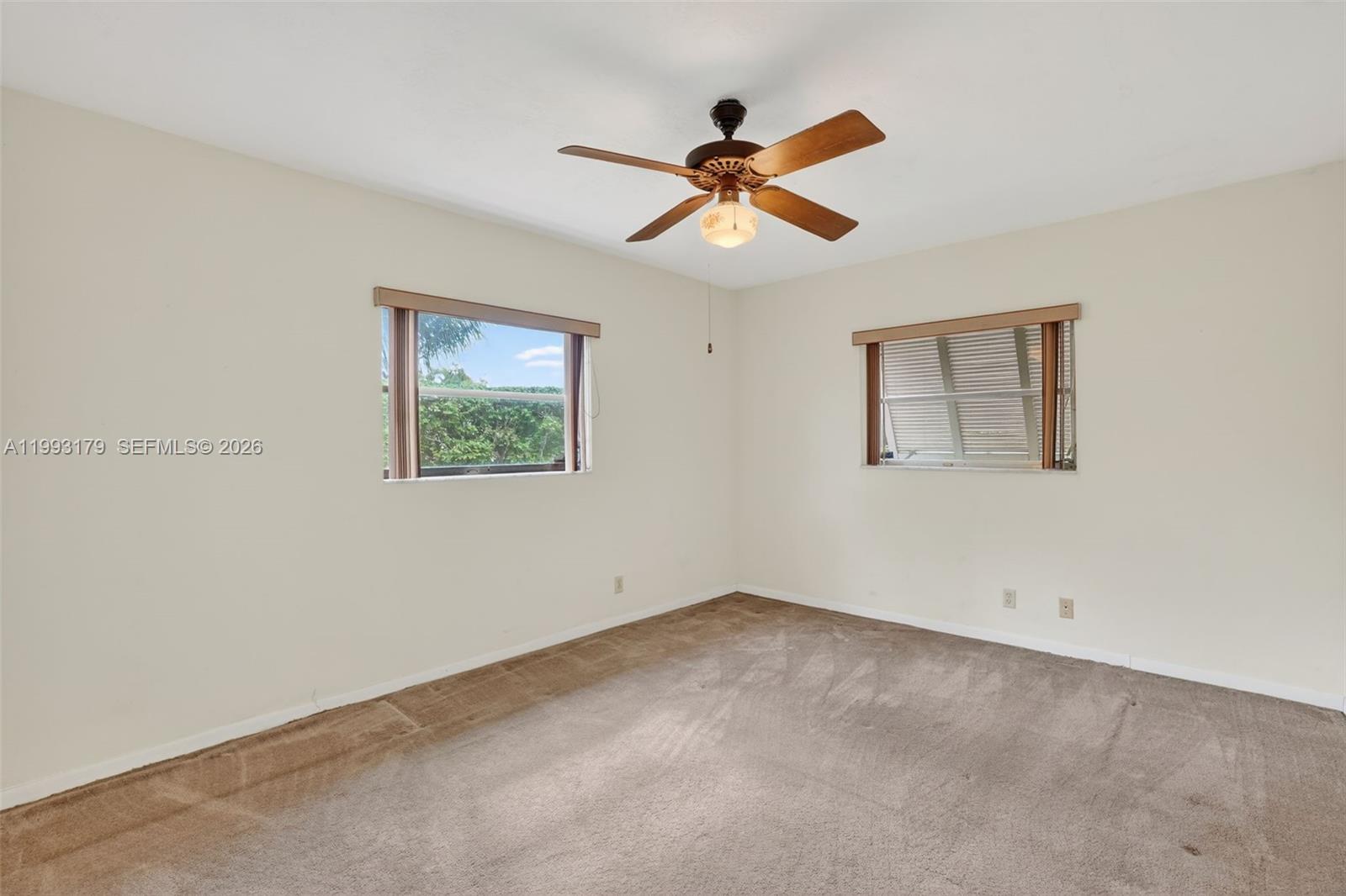 10753 Southwest 118th Street Miami, FL 33176 - Photo 33 of 51 a view of an empty room with a window