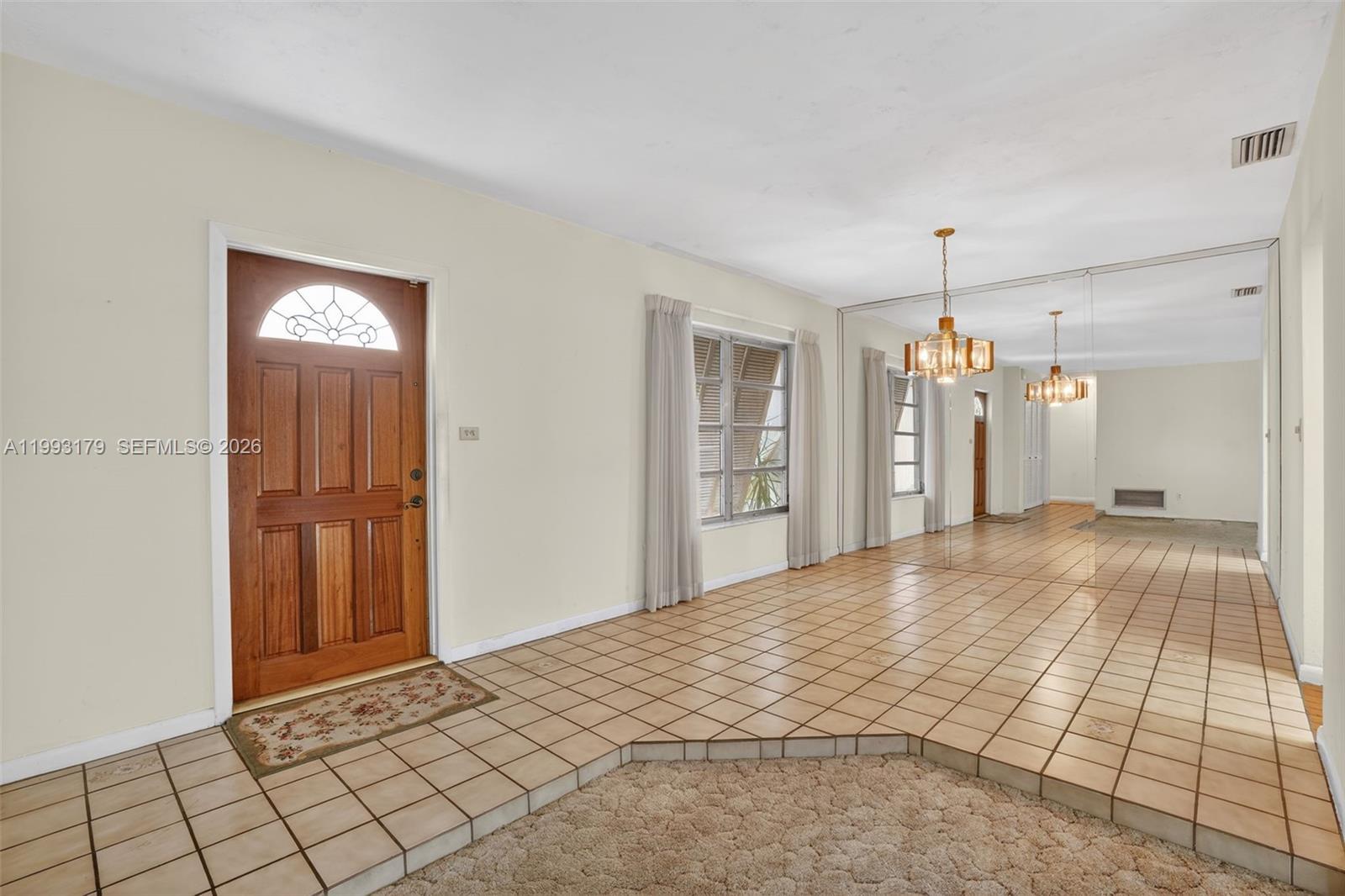 10753 Southwest 118th Street Miami, FL 33176 - Photo 4 of 51 a view of an empty room and window