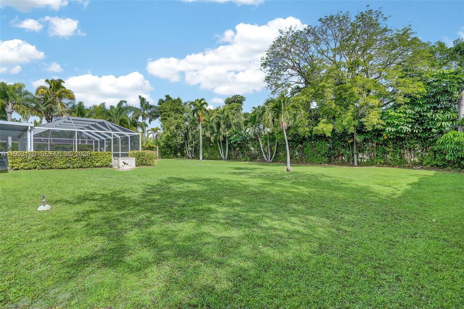 10753 Southwest 118th Street Miami, FL 33176 - Photo 41 of 51 a view of a house with a big yard