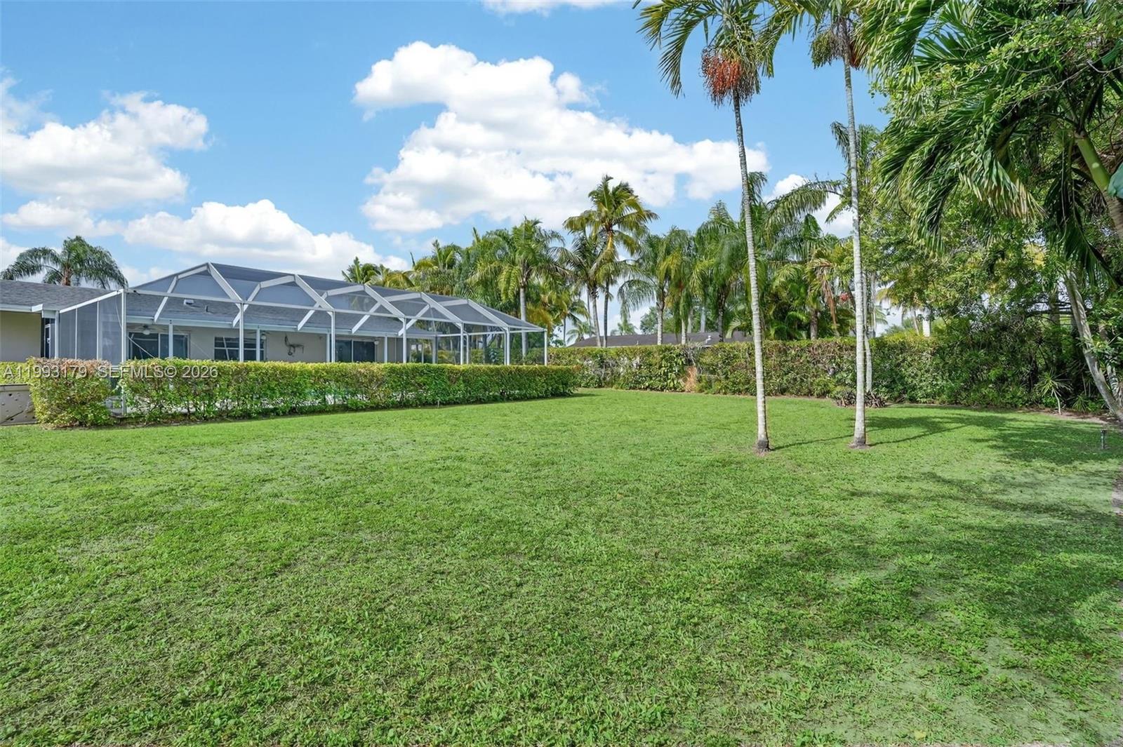 10753 Southwest 118th Street Miami, FL 33176 - Photo 43 of 51 a view of a park with a house in the background