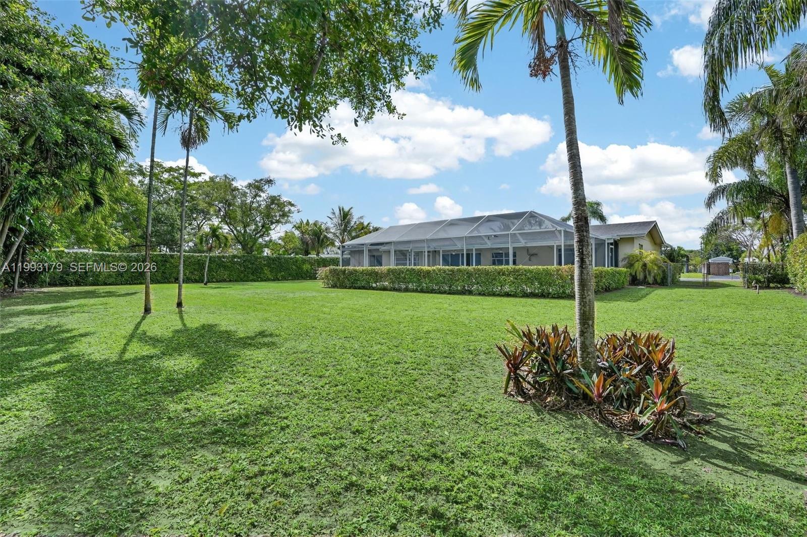 10753 Southwest 118th Street Miami, FL 33176 - Photo 44 of 51 a view of a park with a tree